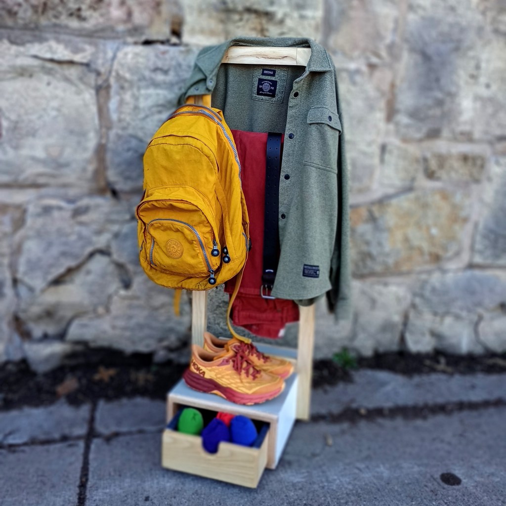 Valet stand with clothing