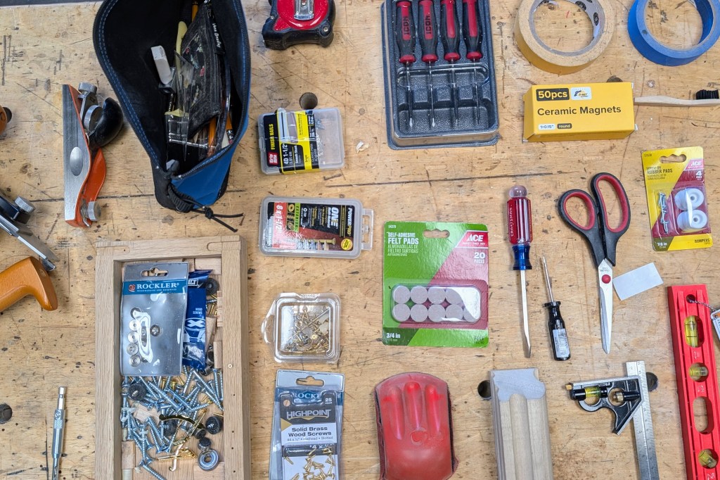 Knolling tools on a workbench.
