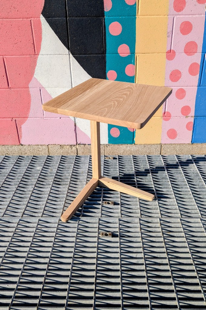 Three-quarter view of cantilevered laptop desk