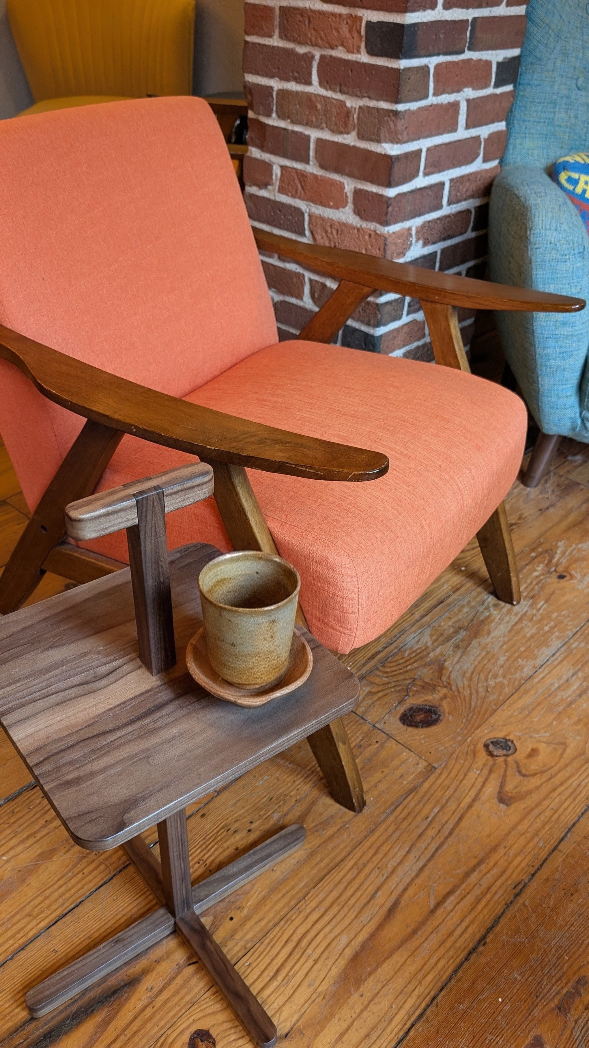 Small drink table with tea cup and saucer