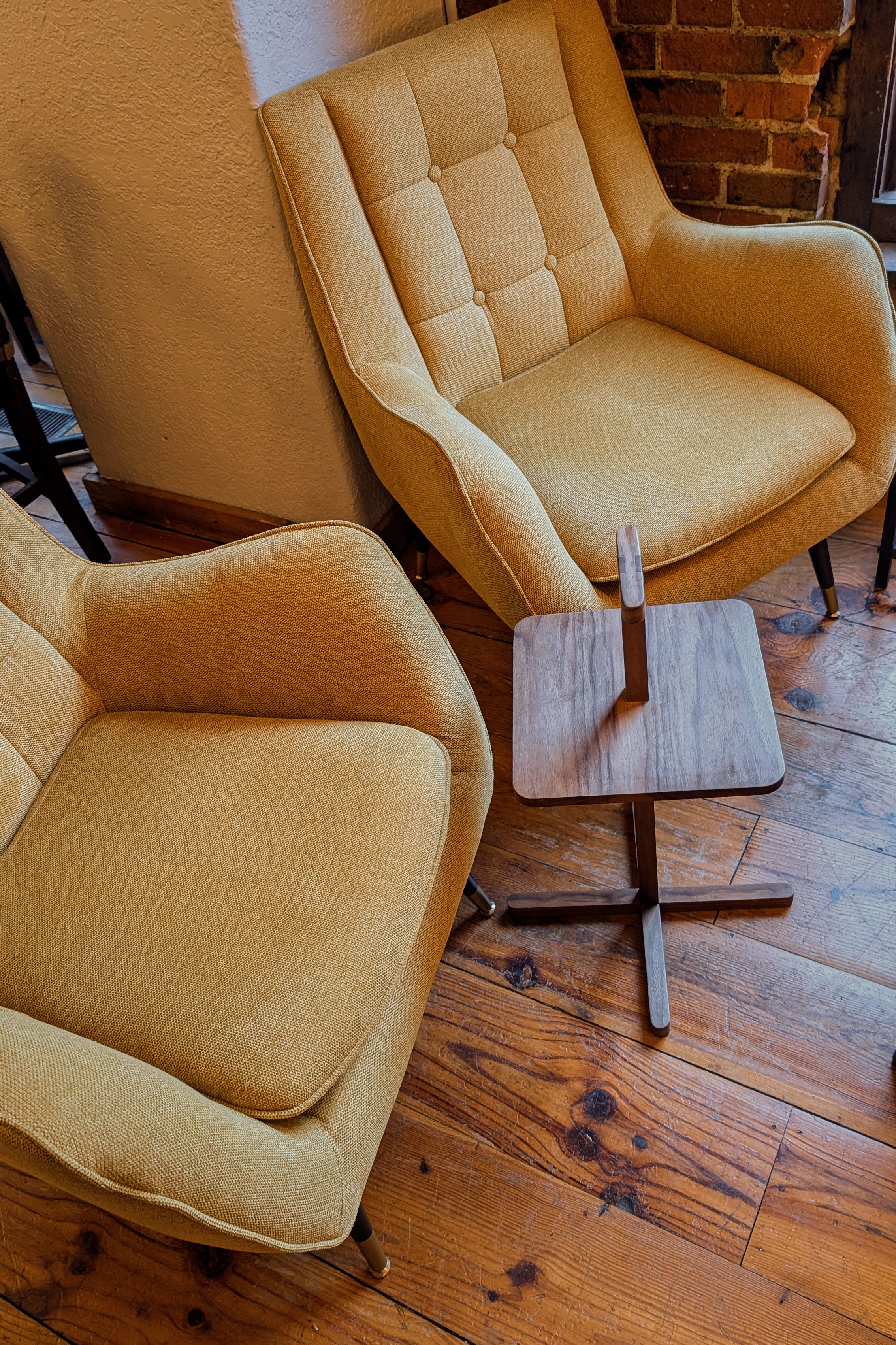 Drink table between two chairs