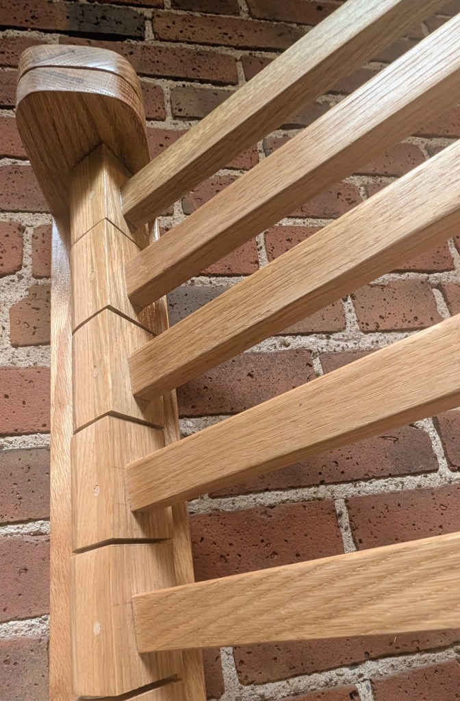 Detail of wall mounted clothing rack arms