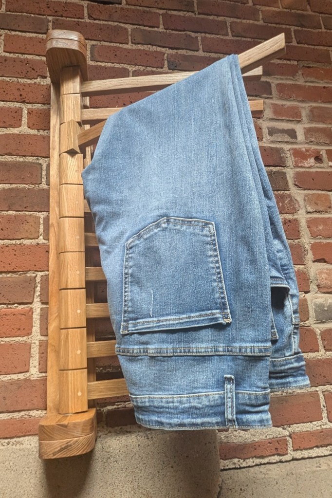 Wall mounted clothing rack