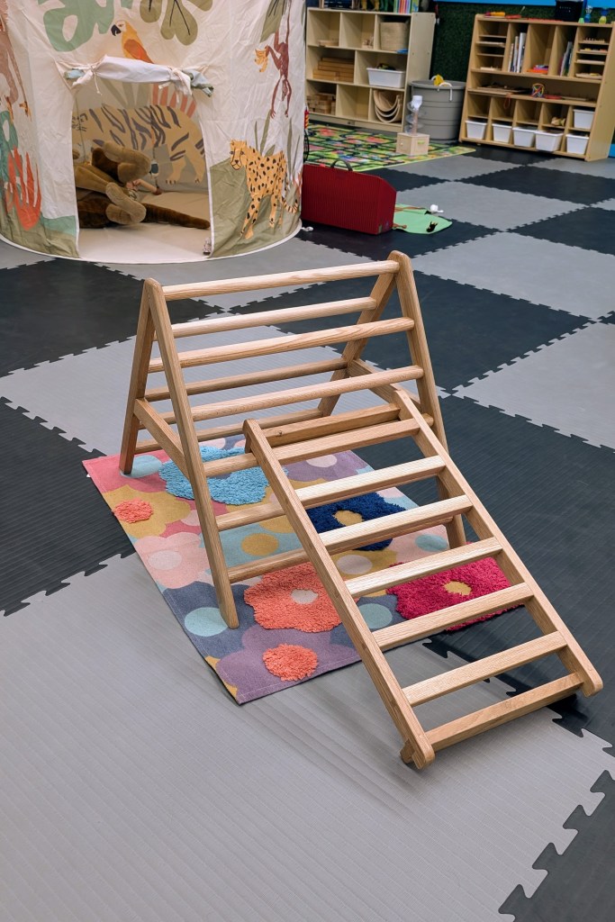 Kids climbing triangle with ladder ramp